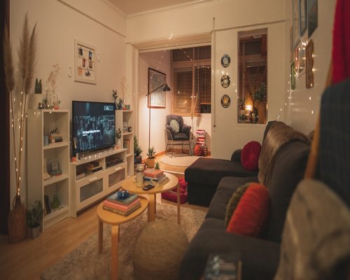 Calm living room in the evening, well lit but cozy